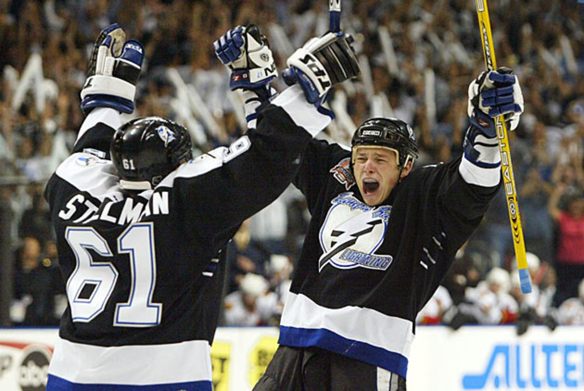 Game 7 hero Ruslan Fedotenko (right) exulted after scoring the second of his two goals.